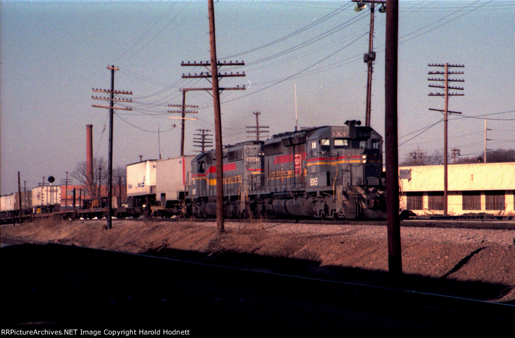 SBD 8065 & 8087 lead a southbound pig train